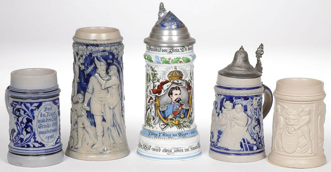 GROUP OF FIVE GERMAN BEER STEINS: GROUP OF FIVE GERMAN BEER STEINS. Including four examples and one contemporary King Ludwig porcelain stein, greatest height 10 inches. SHIPPING NOTICE: Jackson's is your sole and only source for