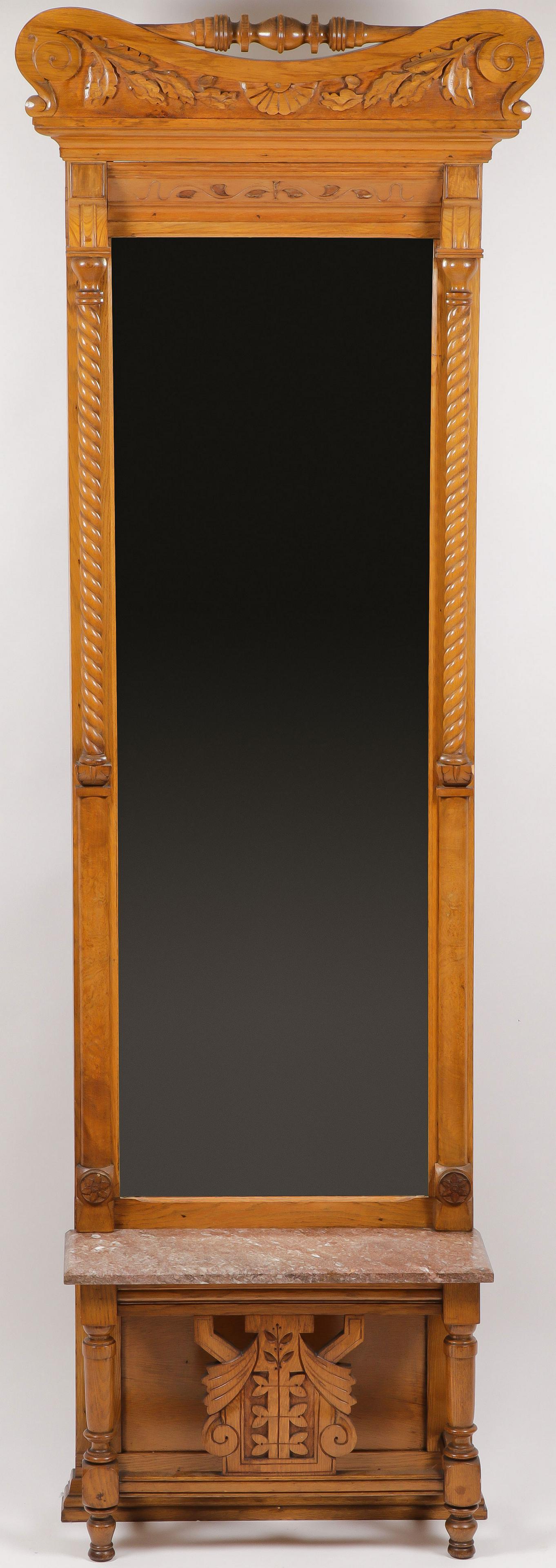 VICTORIAN OAK HALL MIRROR: VICTORIAN OAK HALL MIRROR. With twist carved columns, marble top shelf, and carved crest. Height 92 inches, width 30 inches. SHIPPING NOTICE: Jackson's is your sole and only source for one stop p