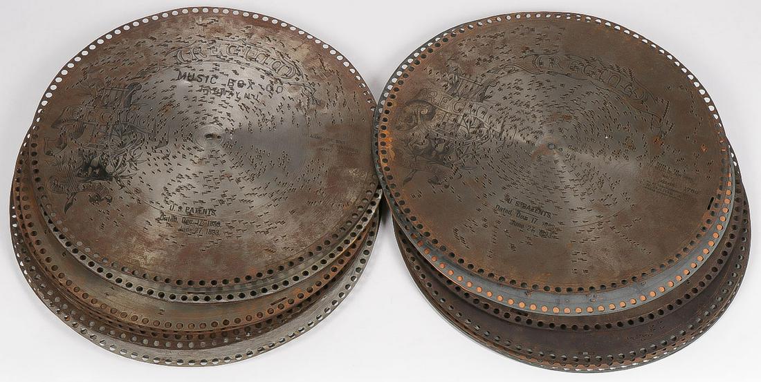 REGINA MUSIC BOX DISCS: REGINA MUSIC BOX DISCS. Comprising 27 individual 15.5-inch discs, all titled and many with patent dates circa 1893. SHIPPING NOTICE: Jackson's is your sole and only source for one stop packing