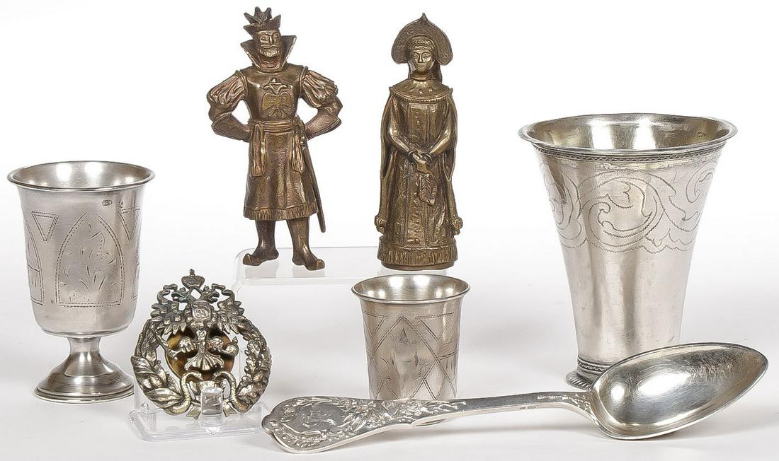 RUSSIAN SILVER & DECORATIVE ARTS GROUP: RUSSIAN SILVER & DECORATIVE ARTS GROUP. Comprising seven individual pieces including a heavy silver spoon with Cyrillic maker's mark of Ovchinikov, three silver beakers, an imperial Russian medica