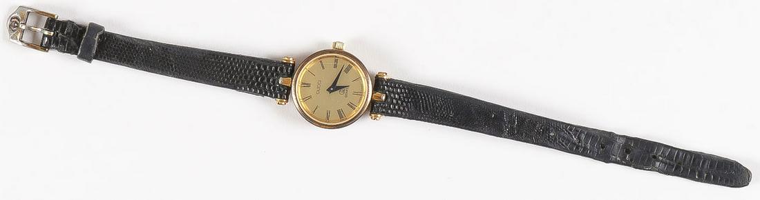 A LADY GUCCI QUARTZ WRIST WATCH: A LADY GUCCI QUARTZ WRIST WATCH. In original box, as shown.SHIPPING NOTICE:Jackson's is your sole and only source for one stop packing and shipping. With over 50 years of experience, our profess