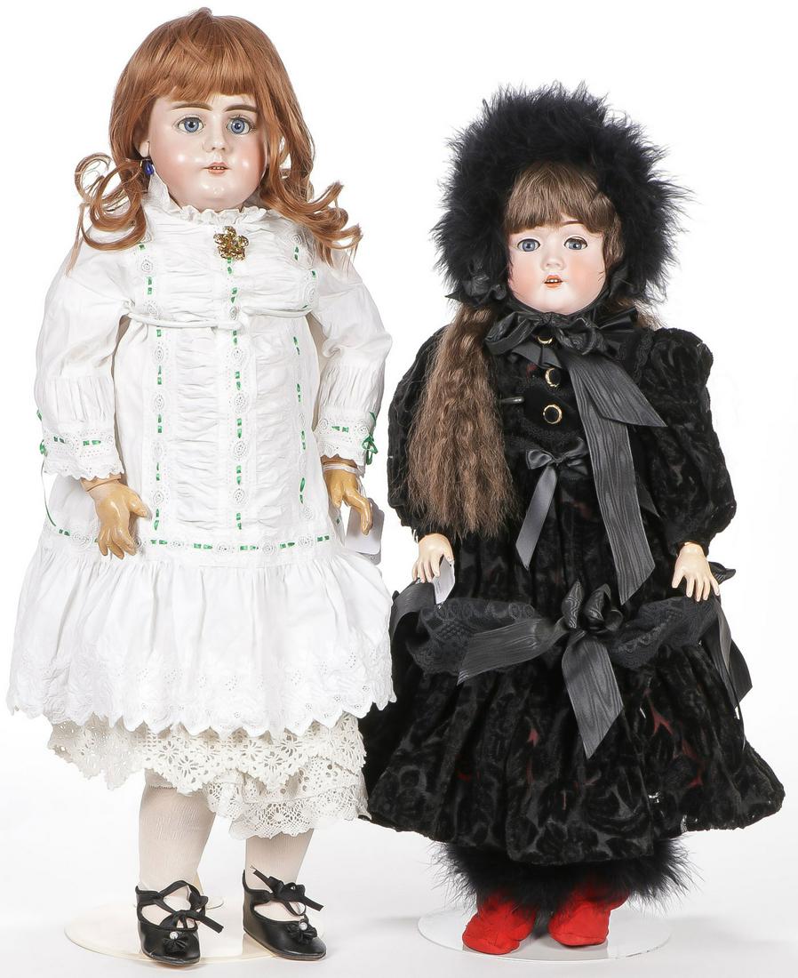 TWO FINE HANDWERCK & MAX GERMAN BISQUE DOLLS: TWO FINE HANDWERCK & MAX GERMAN BISQUE DOLLS. The first being a 29-inch 79 DEP Handwerck with blue sleep eyes, pierced ears, and wearing antique white clothing. The second being a 24-inch Max