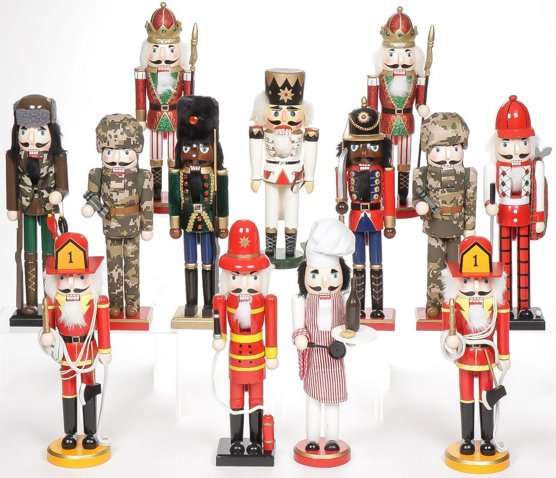 13 DECORATIVE CHRISTMAS NUTCRACKERS: 13 DECORATIVE CHRISTMAS NUTCRACKERS. In various costumes as shown, measuring between 13 inches and 15 inches height. SHIPPING NOTICE:Jackson's is your sole and only source for one stop packing a