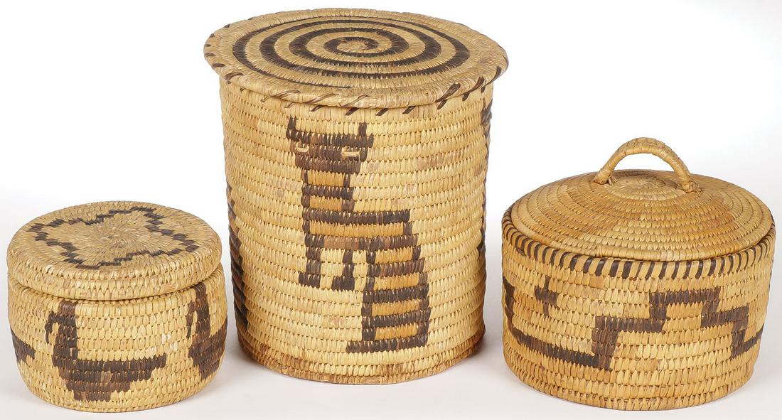 PAPAGO WOVEN COVERED JARS: PAPAGO WOVEN COVERED JARS. Comprising three individual examples, one woven with a repeating pattern of a coyote, one with birds, and the other with stepped banding and crosses. Each with fitted lid. G