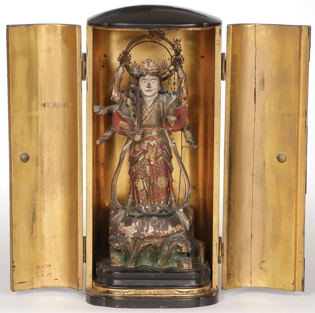 JAPANESE BENTEN ZUSHI SHRINE: JAPANESE BENTEN ZUSHI SHRINE Black lacquered case with gilt hardware (missing door latch) opening to reveal a carved polychrome and gilt decorated wood figure of the Japanese Buddhist goddess Benzaite