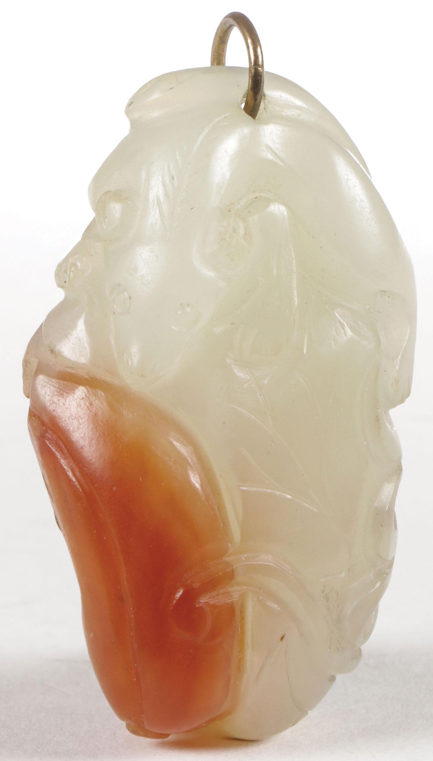 A CHINESE CARVED JADE FIGURAL PENDANT, QING (1 of 2)