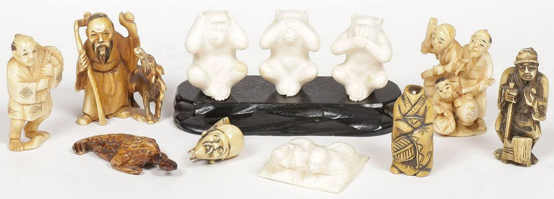 JAPANESE CARVED NETSUKES AND OKIMONO: JAPANESE CARVED NETSUKES AND OKIMONO. Comprising four carved bone netsukes and three okimonos including an erotic man and woman, as well as the three wise monkeys, and a small aquatic creature snuff b