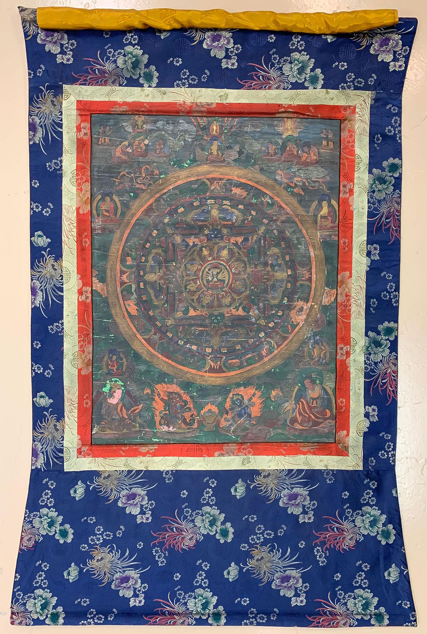 A CHINESE TIBETAN BUDDHIST TANGKA: A CHINESE TIBETAN BUDDHIST TANGKA. 49 inches x 31 inches. SHIPPING NOTICE: Jackson's is your sole and only source for one stop packing and shipping. With over 50 years of experience, our professional,