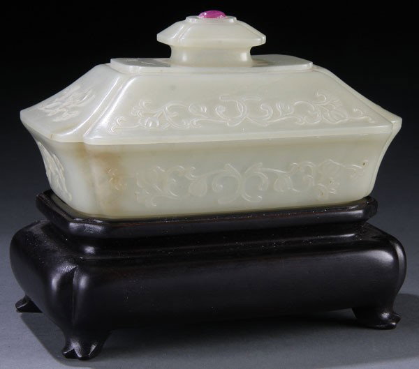 A CHINESE MUGHAL STYLE WHITE JADE COVERED BOX: A FINE CHINESE MUGHAL STYLE CARVED WHITE JADE COVERED BOX, LATE QING/EARLY REPUBLIC PERIOD. Carved in a translucent celadon colored white jade, the well hollowed rectangular box with shaped and fluted