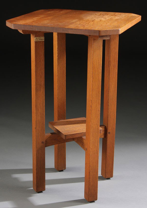 L. & J.G. STICKLEY OAK ARTS & CRAFTS DRINK STAND: A VERY FINE L. & J.G. STICKLEY OAK ARTS & CRAFTS DRINK STAND, No. 574, Fayetteville, New York, circa 1912. With "cut corner" top raised on squared legs joined by an offset shelf, signed with red decal
