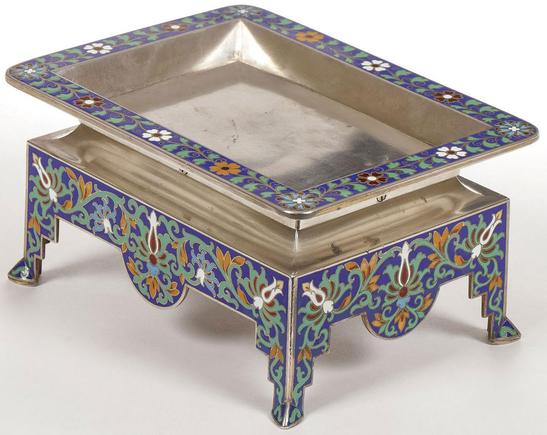UNIQUE RUSSIAN SILVER & ENAMEL CARD HOLDER: UNIQUE RUSSIAN SILVER & ENAMEL CARD HOLDER, GRACHEV, C. 1890. Resting on four legs with spread feet, the apron overall decorated in champlevÃ© enamel and the card receptacle also banded in champleve