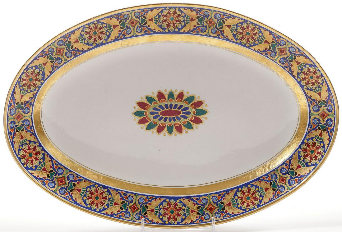 RUSSIAN IMPERIAL PORCELAIN PLATTER GOTHIC SERVICE: RUSSIAN IMPERIAL PORCELAIN PLATTER GOTHIC SERVICE, NI. The borders of the oval porcelain platter hand decorated with stained glass window motives above a wide gilt band and the cavetto with hand paint