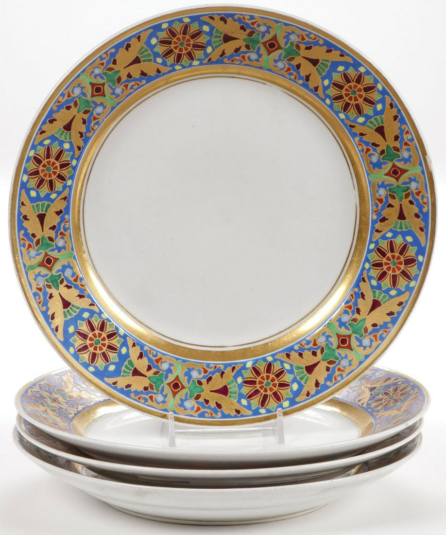 FOUR IMPERIAL RUSSIAN PORCELAIN PLATES, GOTHIC: FOUR IMPERIAL RUSSIAN PORCELAIN PLATES, GOTHIC SERVICE. Comprising four dinner plates from the Gothic Service. The borders banded with ornamental ribbon in gothic stained glass motives and with gilt b