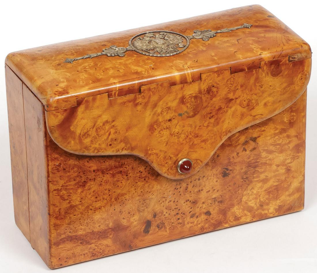UNIQUE RUSSIAN KARELIAN BIRCH SMOKING BOX: UNIQUE RUSSIAN KARELIAN BIRCH SMOKING BOX. Comprising a finely crafted karelian birch box of rectangular form. The hinged lid set with a chased silver gilt Imperial Eagle and cabochon, intricately des