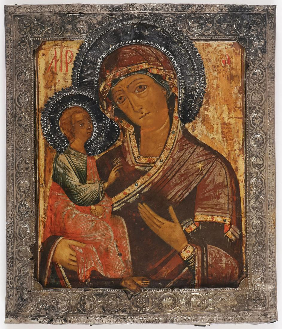 RUSSIAN ICON, JERUSALEM MOTHER OF GOD, C. 1700: RUSSIAN ICON, JERUSALEM MOTHER OF GOD, C. 1700. Comprising a less frequently encountered Hodegetria type Mother of God, with silver repousse and chased basma, and with silver halos. The basma hallmark