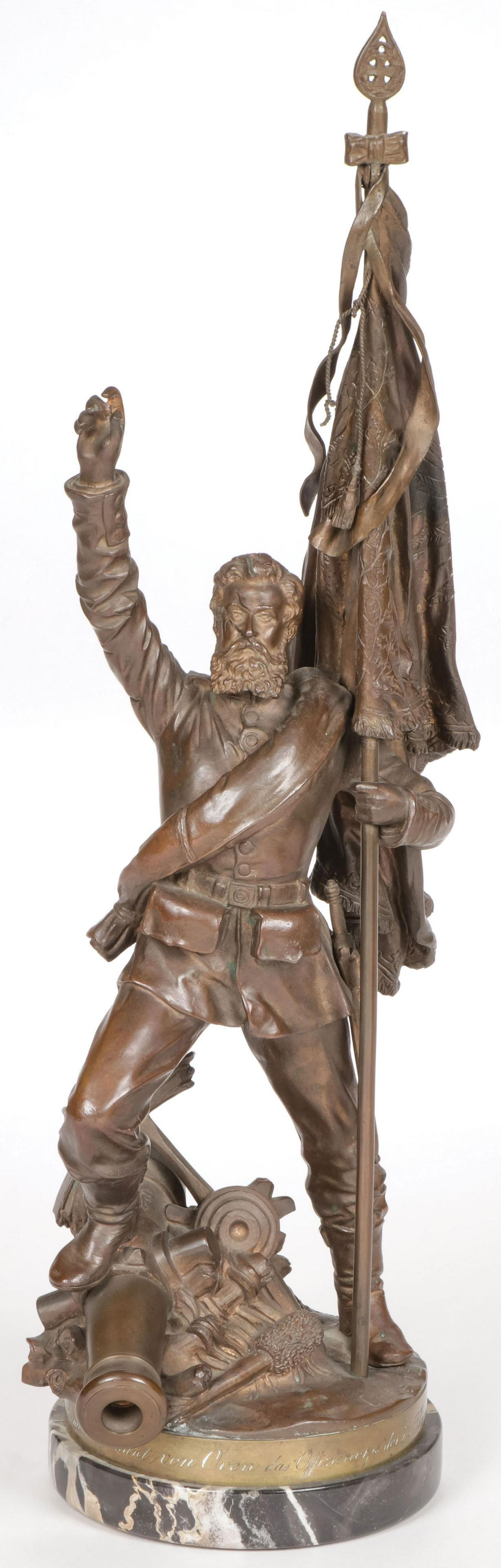 A GOOD MILITARY BRONZE: CHRISTOPHER LENZ (1829-1915) Standard Bearer of the 7th Thuringian Inft. Regl. - 1885 Bronze with brown patina on marble base Signed, dated and with dedicatory inscription Overall height including bas
