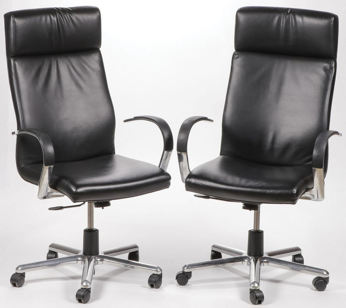 PR JACK CARTWRIGHT LEATHER EXECUTIVE CHAIRS: PR JACK CARTWRIGHT LEATHER EXECUTIVE CHAIRS. Comprising two 2013 manufactured Jack Cartwright rolling office arm chairs with black leather upholstery, height 48 inches, width 27 inches, depth 20 inche