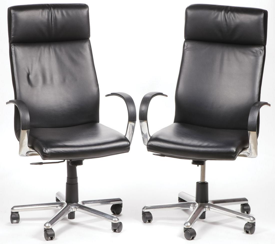 PR JACK CARTWRIGHT LEATHER EXECUTIVE CHAIRS: PR JACK CARTWRIGHT LEATHER EXECUTIVE CHAIRS. Comprising two 2013 manufactured Jack Cartwright rolling office arm chairs with black leather upholstery, height 48 inches, width 27 inches, depth 20 inche