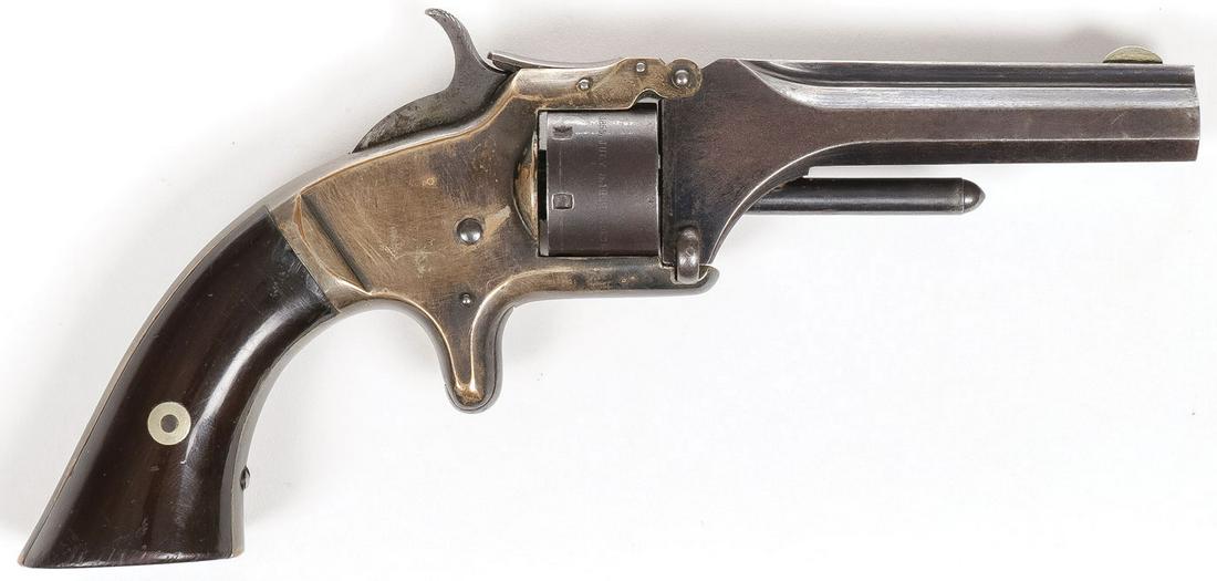 SW MODEL No. 1 SECOND ISSUE REVOLVER: SW MODEL No. 1 SECOND ISSUE REVOLVER. .22 short rimfire caliber, 7 shot non-fluted cylinder, 3 inch octagonal barrel, rosewood grips, blued barrel and cylinder with brass frame, serial # 102300, takes
