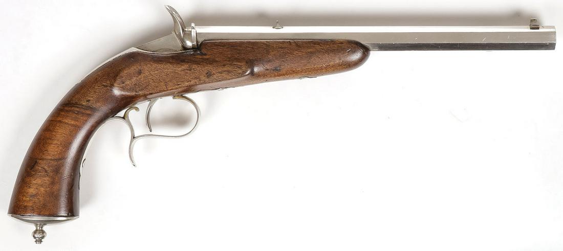 FLORBERT SINGLE SHOT PISTOL: FLORBERT SINGLE SHOT PISTOL. Walnut stock, nickel plated with accompanying felt lined case and two tins of .22 cal short ammunition and other accoutrements as shown. Length of gun 15 inches. SHIPPING