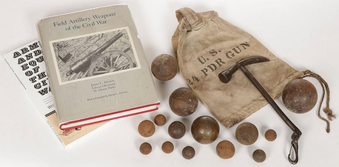 CIVIL WAR ARTILLERY GROUP: CIVIL WAR ARTILLERY GROUP. Comprising 14 grapeshot balls, a hammer, a canvas powder bag, and two books on Civil War artillery and arms, including "Field Artillery Weapons of the Civil War" by James C.