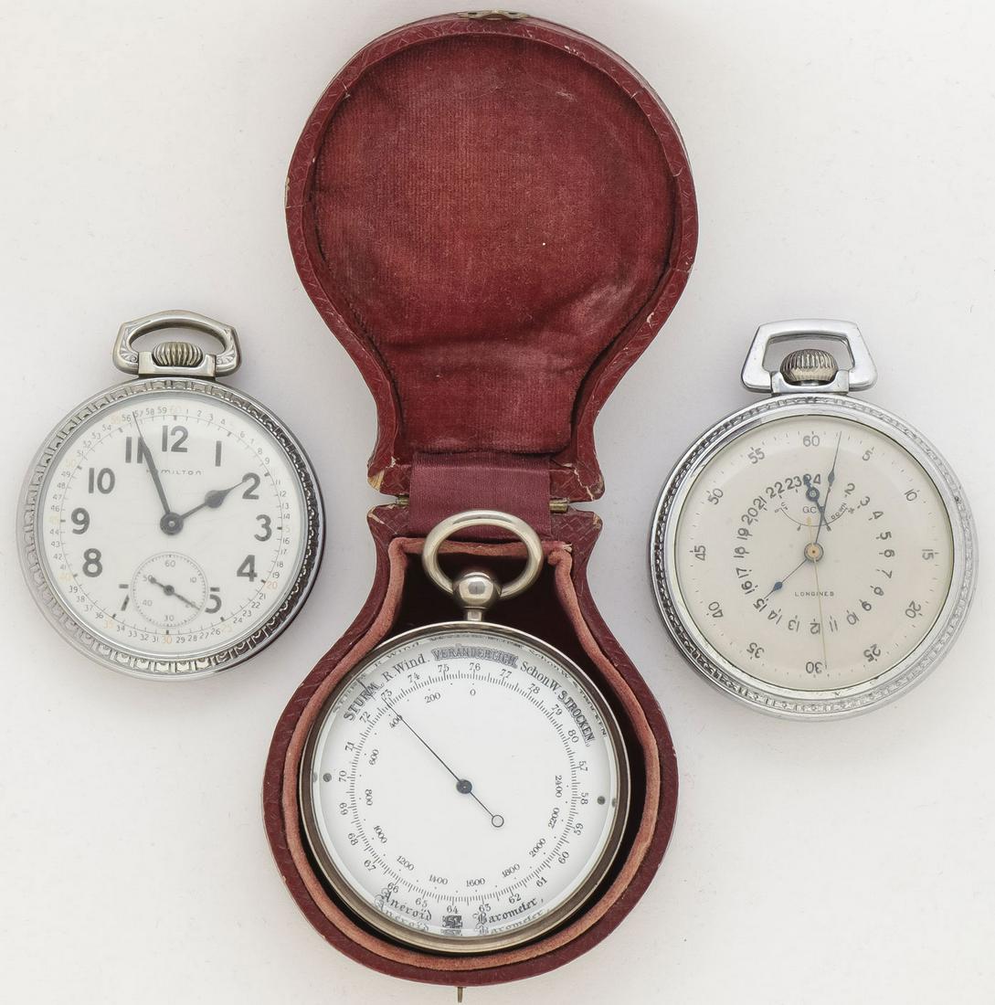LONGINES NAVIGATION MASTER POCKET WATCH & MORE: LONGINES NAVIGATION MASTER POCKET WATCH & MORE. Comprising a Longines GCT US Army Deck Navigation 24 Hour, 21.29 Chronometer Pocket Watch (runs). Together with a Strum Veranderlich Pocket Aneroid Baro
