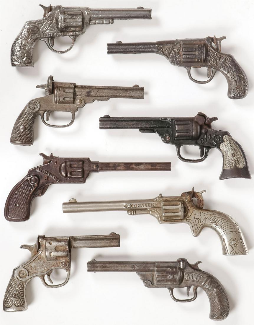 VINTAGE CAST IRON CAP GUNS: VINTAGE CAST IRON CAP GUNS. Comprising eight different models, various makers, designs, and finishes, as shown.Greatest length 9 inches. SHIPPING NOTICE: Jackson's is your sole and only source for one