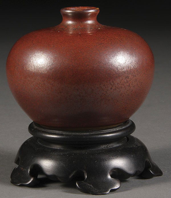 A FINE CHINESE ROUGE-GLAZED POTTERY VASE: A FINE CHINESE ROUGE-GLAZED POTTERY VASE, PROBABLY QING DYNASTY, GUANGXU PERIOD. Of squat bulbous form with fine dark brown mottling, Guangxu reign mark in blue underglaze. Height 2.25 inches (5.75 cm