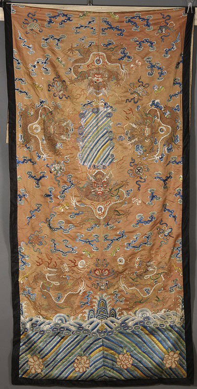 A CHINESE CHING DYNASTY EMBRIODERED SILK KESI: AN EXCEPTIONAL CHINESE CHING DYNASTY EMBROIDERED SILK KESI (ALTAR CLOTH), finely stitched with eight 5-toed metallic dragons, stylized cloud forms and Buddhist symbols reserved on a red ground with ea