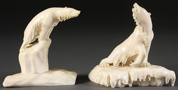 A GOOD PAIR OF INUIT CARVED WALRUS TUSK IVORY: A GOOD PAIR OF INUIT CARVED WALRUS TUSK IVORY FIGURES, 20TH CENTURY, each modeled as a pair of polar bears and inscribed "O.R.J.-59" (CR Johansen). Height 4.5 inches.