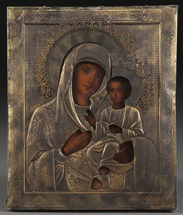 RUSSIAN ICON : IVERSKAYA MOTHER OF GOD: A RUSSIAN ICON OF THE IVERSKAYA MOTHER OF GOD, 19TH CENTURY. Painted in the Western style and overlaid with an engraved silver-gilt riza, hallmarked Moscow, 84 silver standard, dated 1893, and with Cy
