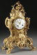 558: A FRENCH LOUIS XVI STYLE GILT BRONZE MANTLE CLOCK,