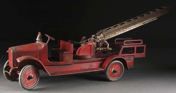 BUDDY L TOY FIRE AERIAL TRUCK: A BUDDY L TOY FIRE AERIAL TRUCK, EARLY 20TH CENTURY. Length 21 inches.