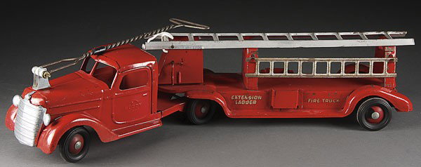 AN EARLY BUDDY L TOY "SIT AND RIDE" PRESSED STEEL: AN EARLY BUDDY L TOY "SIT AND RIDE" PRESSED STEEL FIRE TRUCK, CIRCA 1930'S, seat absent. Length 30 inches.