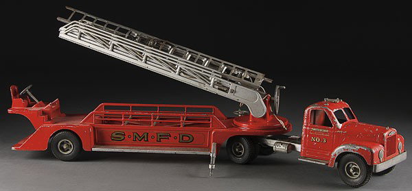 A SMITH MILLER TOY AERIAL FIRE LADDER: A SMITH MILLER TOY AERIAL FIRE LADDER, MID 20TH CENTURY, engine number 3, loss to mascot. Length 37 inches.