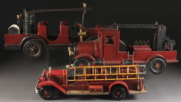CONTEMPORARY WOOD AND METAL FIRE TRUCKS: THREE CONTEMPORARY WOOD AND METAL FIRE TRUCKS, LATE 20TH CENTURY. Including a 24 inch all metal fire engine, an all wood fire engine, and a fire truck with wood body with metal fenders; all by unknown