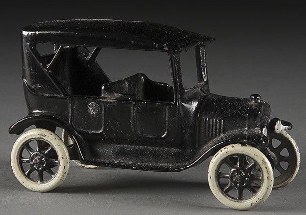 A VERY FINE ARCADE CAST IRON TOY MODEL T: A VERY FINE ARCADE CAST IRON TOY MODEL T, EARLY 20TH CENTURY, with good original finish. Length 6.5 inches.
