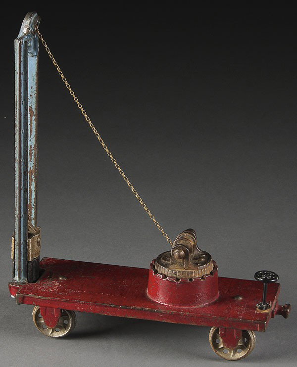 A FINE ARCADE CAST IRON TOY PILE DRIVER RAIL CAR,: A FINE ARCADE CAST IRON TOY PILE DRIVER RAIL CAR, EARLY 20TH CENTURY. Length 10 inches.