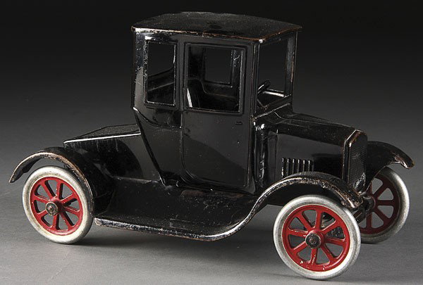 A VERY FINE BUDDY L TOY FLIVER, EARLY 20TH CENTURY: A VERY FINE BUDDY L TOY FLIVER, EARLY 20TH CENTURY, pressed steel with good original finish and decal. Length 11 inches.