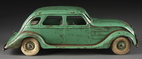 KINGSBURY TOY PRESSED STEEL WIND UP CHRYSLER: A KINGSBURY TOY PRESSED STEEL WIND UP CHRYSLER AIR FLOW, CIRCA 1930'S. Length 14 inches.