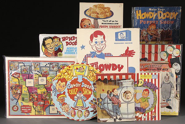 HOWDY DOODY ADVERTISING NOVELTY EPHEMERA: A 12 PIECE HOWDY DOODY ADVERTISING AND NOVELTY EPHEMREA GROUP, MID 20TH CENTURY, comprising a boxed die cut wood behavior chart, two Air-O-Doodle record albums, a rotating quiz show, a puppet show boo