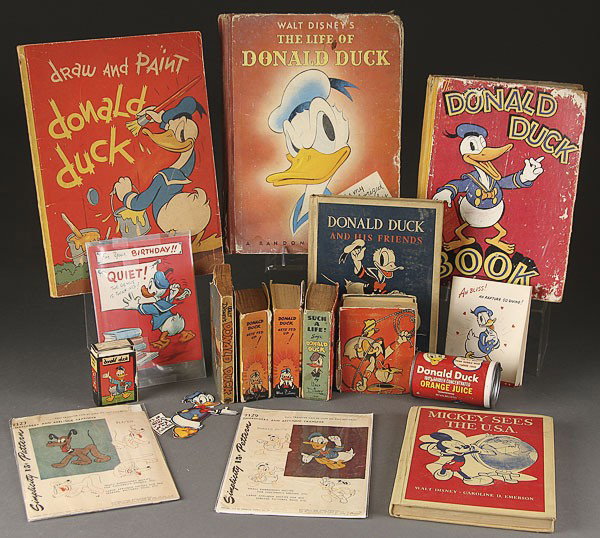 A 21 PIECE DONALD DUCK EPHEMERA & BOOK COLLECTION: A 21 PIECE DONALD DUCK EPHEMRA AND EARLY BOOK COLLECTION, 1930'S TO 1950'S, including better little boxes, a Gene Air story book dated 1939, an Emerson story book, draw and paint, and other items.