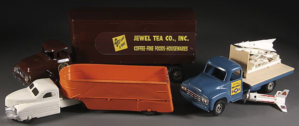 A MARKS BUDDY L AND TONKA TOY GROUP: A MARX BUDDY L AND TONKA TOY GROUP, MID 20TH CENTURY, comprising a Tonka Jewel T semi (restored), a Marx semi, and a Buddy L Air Force truck (incomplete), length 26 inches.