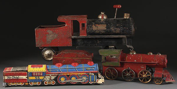 TWO PRESSED STEEL TOY TRAINS KEYSTONE MARX: TWO PRESSED STEEL TOY TRAINS. Early to mid 20th century, comprising a Keystone sit and ride train, a hill climber missing mechanism together with Marx tin litho train some losses.