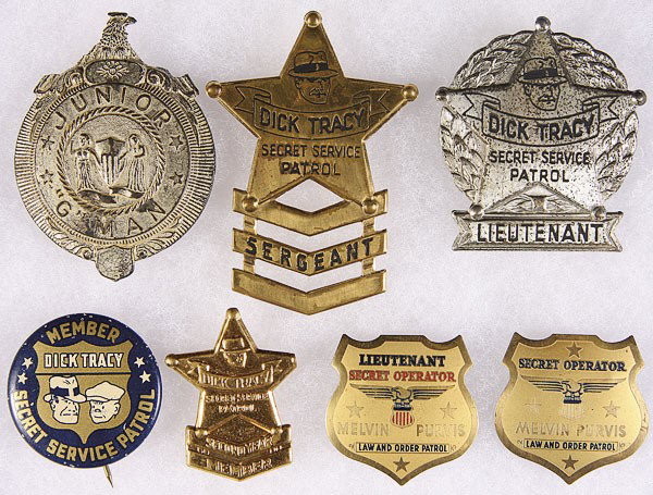 A DICK TRACY MELVIN PURVIS RADIO PREMIUM BADGES: A DICK TRACY AND MELVIN PURVIS RADIO PREMIUM BADGE COLLECTION. Six pieces, mid 20th century, comprising three Dick Tracy badges including a sergeant and lieutenant, a Dick Tracy member pin, two Melvin