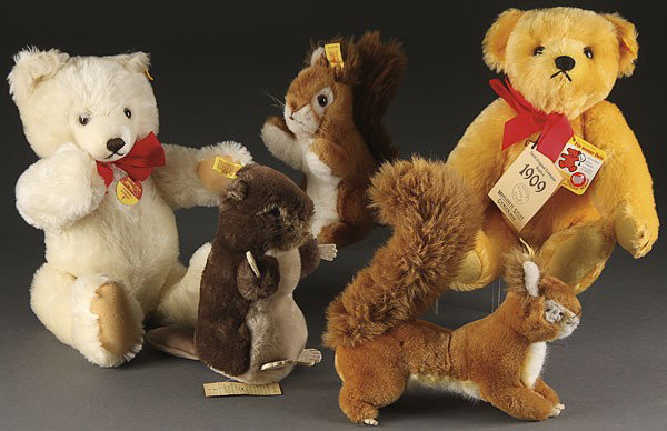 FIVE STEIFF ANIMALS, EARLY TO MID 20TH CENTURY: FIVE STEIFF ANIMALS, EARLY TO MID 20TH CENTURY, consisting of an 11 inch Mohair original teddy bear, a 8 inch beaver, a pair of 8 inch squirrels and a Mohair 10 inch teddy, all with original Steiff bu