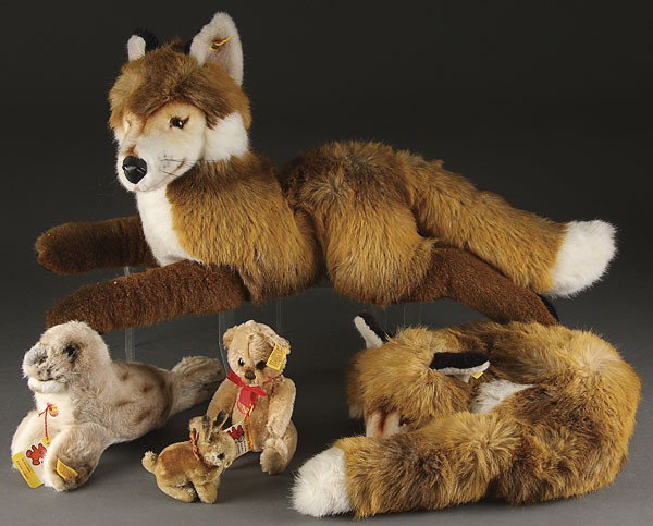 FIVE STEIFF ANIMALS, EARLY TO MID 20TH CENTURY: FIVE STEIFF ANIMALS, EARLY TO MID 20TH CENTURY, consisting of “Robby” the walrus, a 3 inch Mohair “Baby Soft Teddy Bear,” a 24 inch length fox and a sleeping fox all with Steiff tag except the