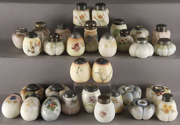 A 32 PIECE MOSTLY MOUNT WASHINGTON SHAKERS: A 32 PIECE COLLECTION OF MOSTLY MOUNT WASHINGTON AND CF MONROE SHAKERS, 19TH CENTURY. Assorted patterns including egg, tomato and twist with several paired sets.
