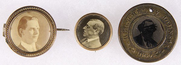 A RARE STEVEN DOUGLAS POLITICAL FERROTYPE: A RARE STEVEN DOUGLAS POLITICAL FERROTYPE, CIRCA 1860. Silvered brass doughnut style with partial Johnson on reverse. Diameter 1 inch, with some rubbing to portraits. Together with a Woodrow Wilson pi