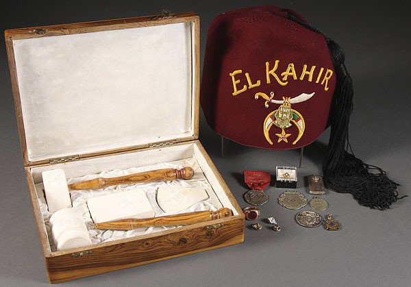 A MASONIC MEMORABILIA COLLECTION.: A MASONIC MEMORABILIA COLLECTION. Comprising a boxed King Solomon quarry (Jerusalem) set with wood handled hammer, gavel, book form and emblem, a 10K Mason's ring, watch fob, medallion, lapel pins, to